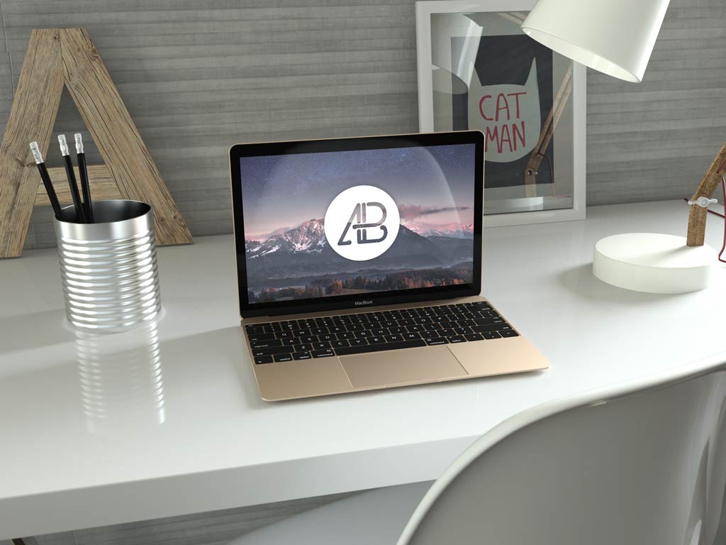 Download Gold MacBook (12 inch) on a Desk Mockup | Mockup World