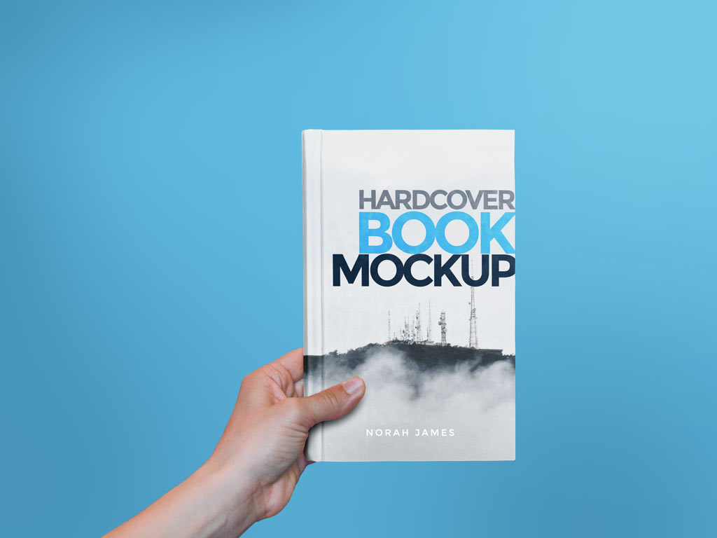 Hardcover Book in Hand Mockup | Mockup World