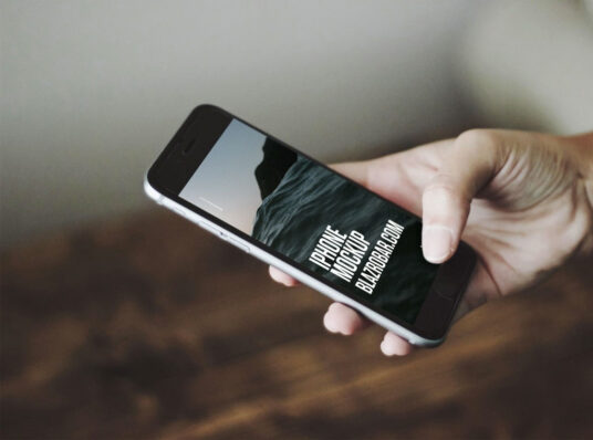 Download iPhone in Hand Mockup | Mockup World