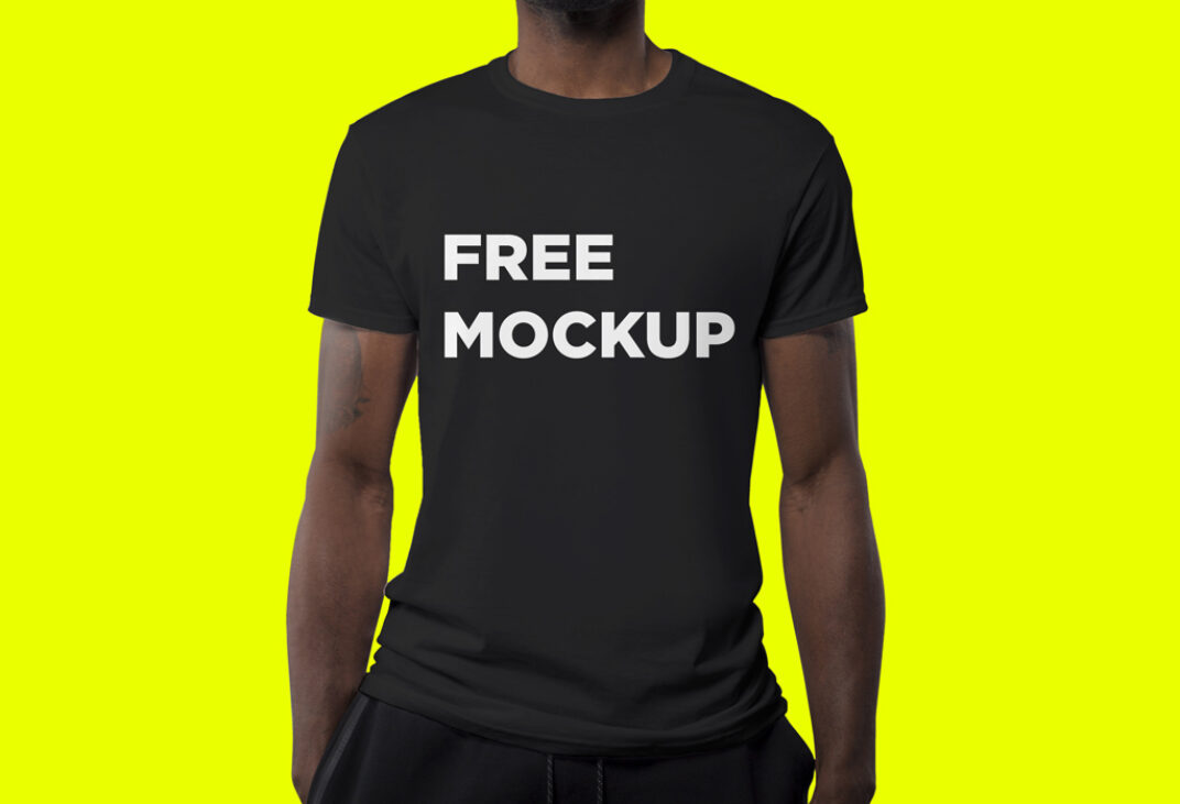 Man wearing black TShirt Mockup Mockup World